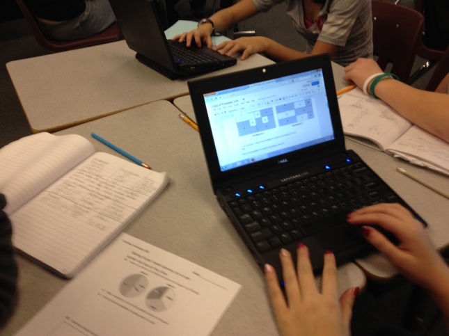 Students analyze probability situations and write about their findings in the Google Doc.